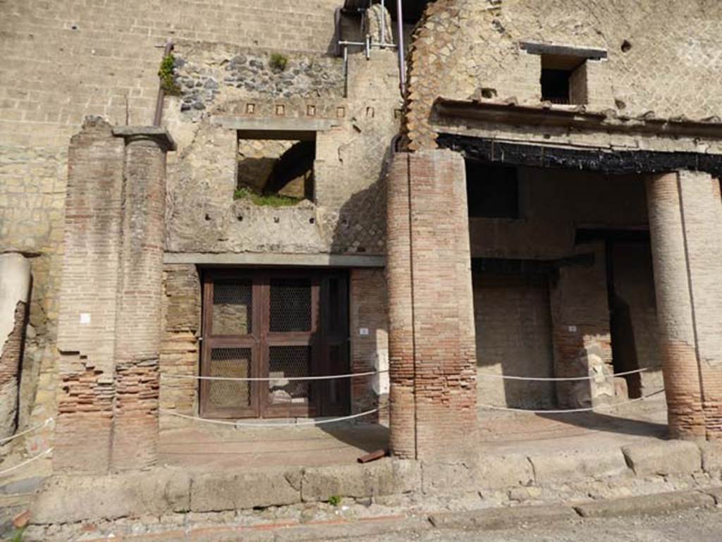 Decumanus Maximus, Herculaneum, October 2014. North side with doorway to a shop numbered 1, centre left. Photo courtesy of Michael Binns.
