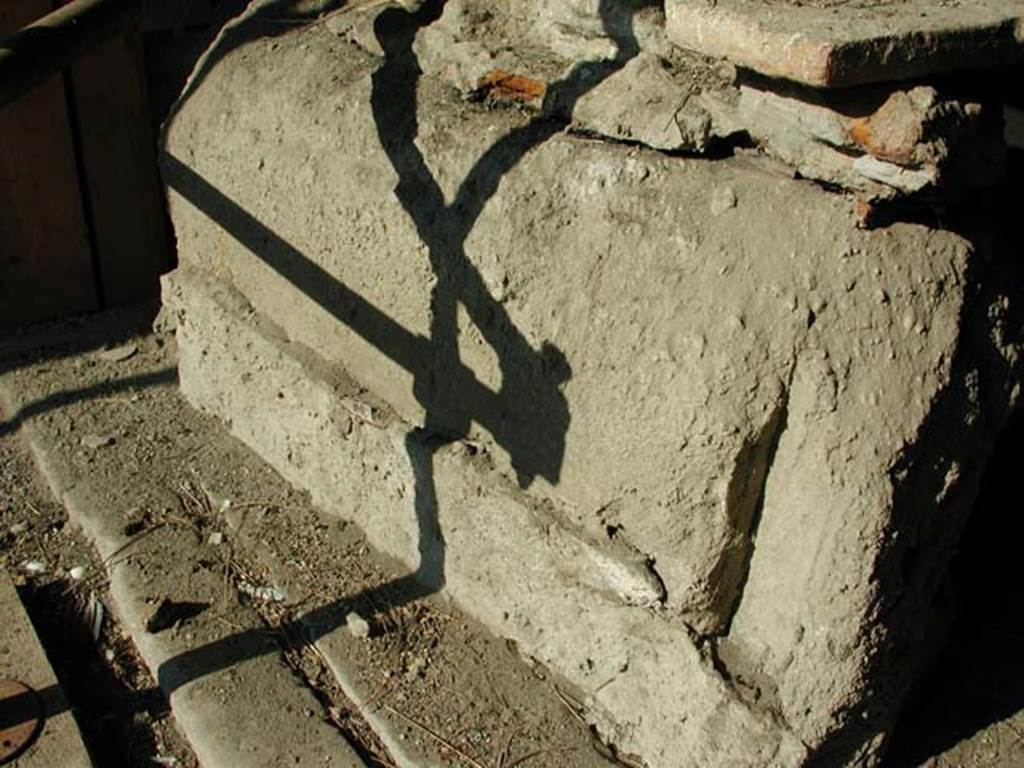 Decumanus Maximus number 4, Herculaneum, September 2003. Looking north-west across threshold in shop.
Photo courtesy of Nicolas Monteix.
