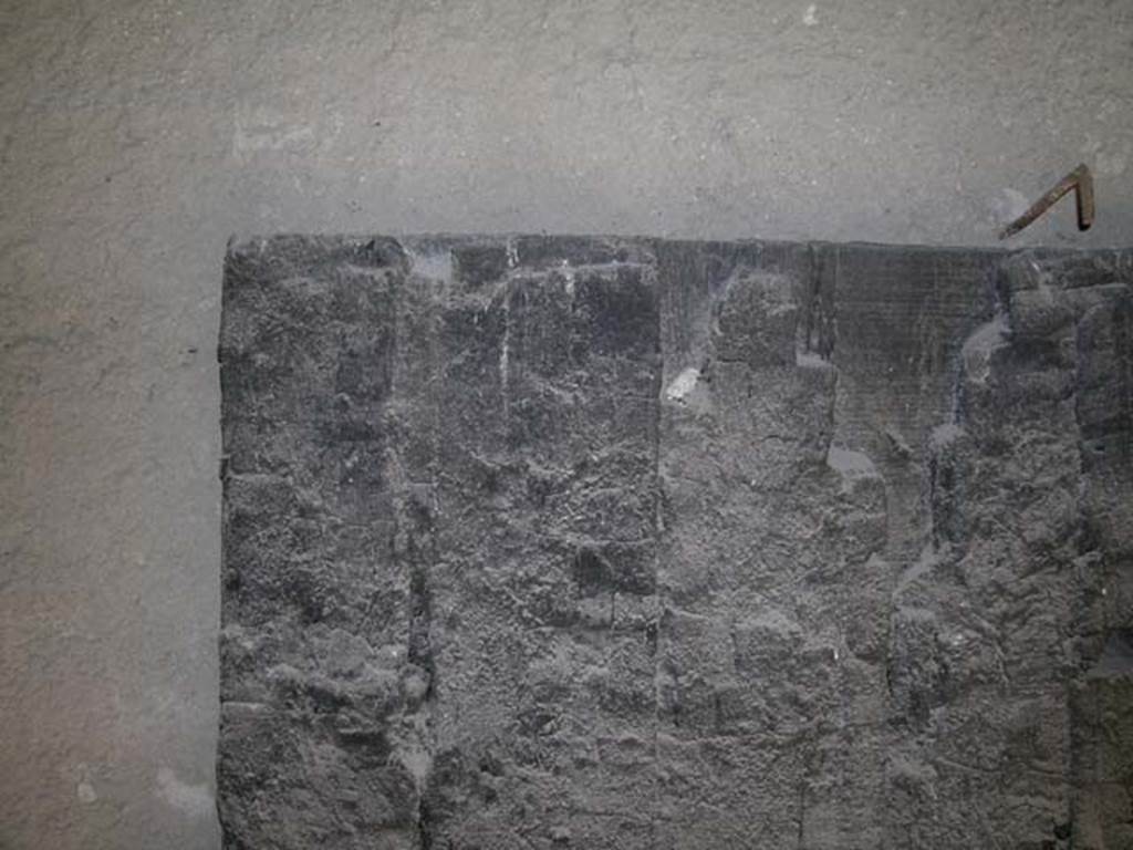 Decumanus Maximus, Herculaneum. May 2006. Carbonised wooden door. Photo courtesy of Nicolas Monteix.