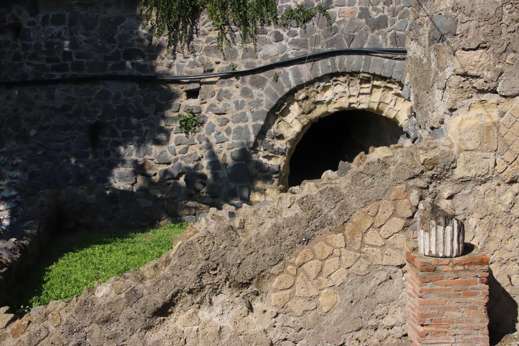 II.3 Herculaneum, October 2022. 
Looking west towards Bourbon tunnel at rear of peristyle, under modern roadway. Photo courtesy of Klaus Heese.
