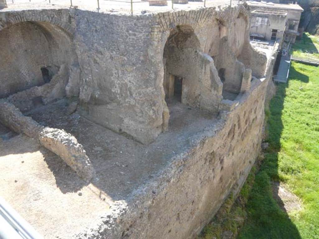 Ins. III.1/2/18/19, Herculaneum, August 2013. Looking north-east from access bridge towards lower rooms. Photo courtesy of Buzz Ferebee.
