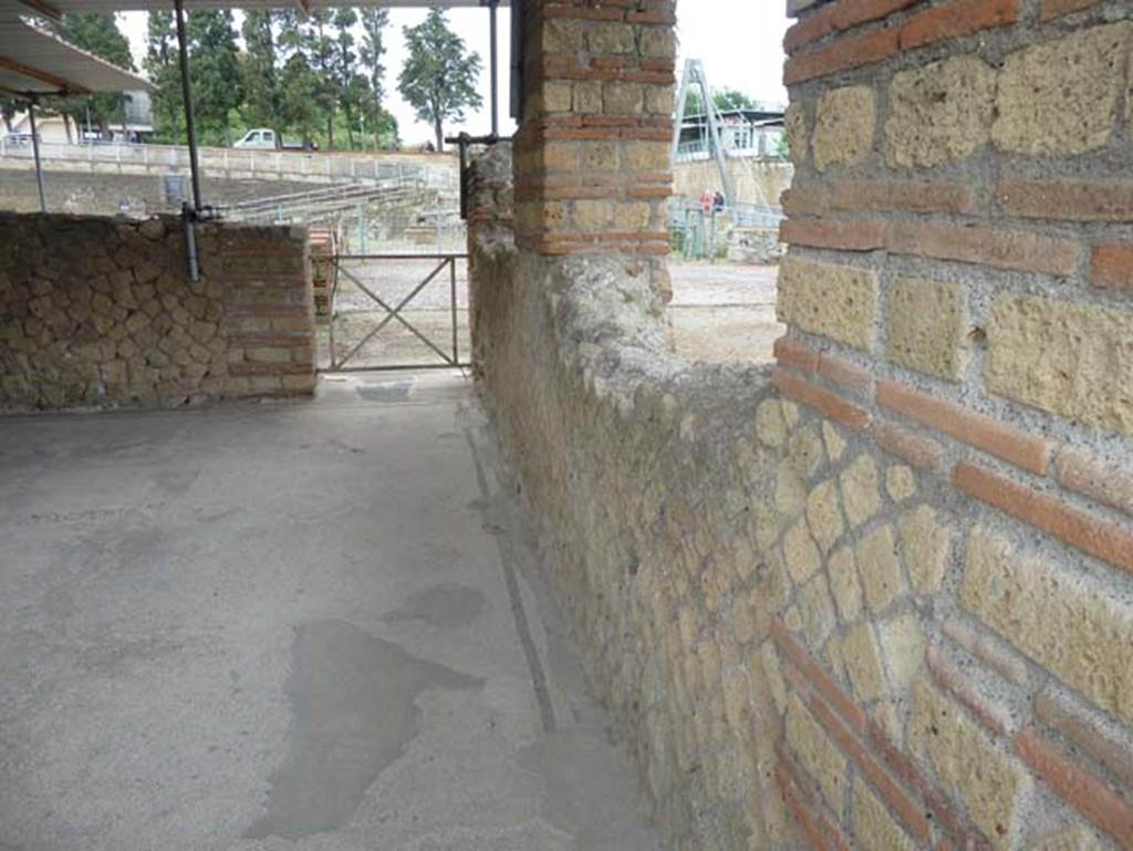 III.1 Herculaneum, September 2015. Room 24, looking south along east wall, and through window into room 25, both rooms opening out onto terrace 22. 
