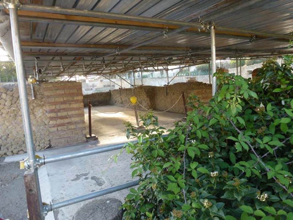 III, 19/18/1, Herculaneum. October 2012. 
Room 23, looking towards doorway on south-east side of portico from peristyle, 31. Photo courtesy of Michael Binns.

