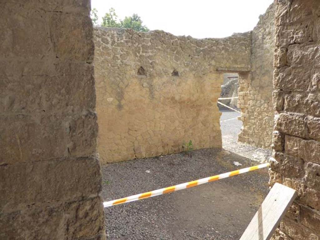 III.19/18/1 Herculaneum, October 2014. Looking south-east across room 34, towards doorway into room 32. From north-east corner of Peristyle 31.  Photo courtesy of Michael Binns.
