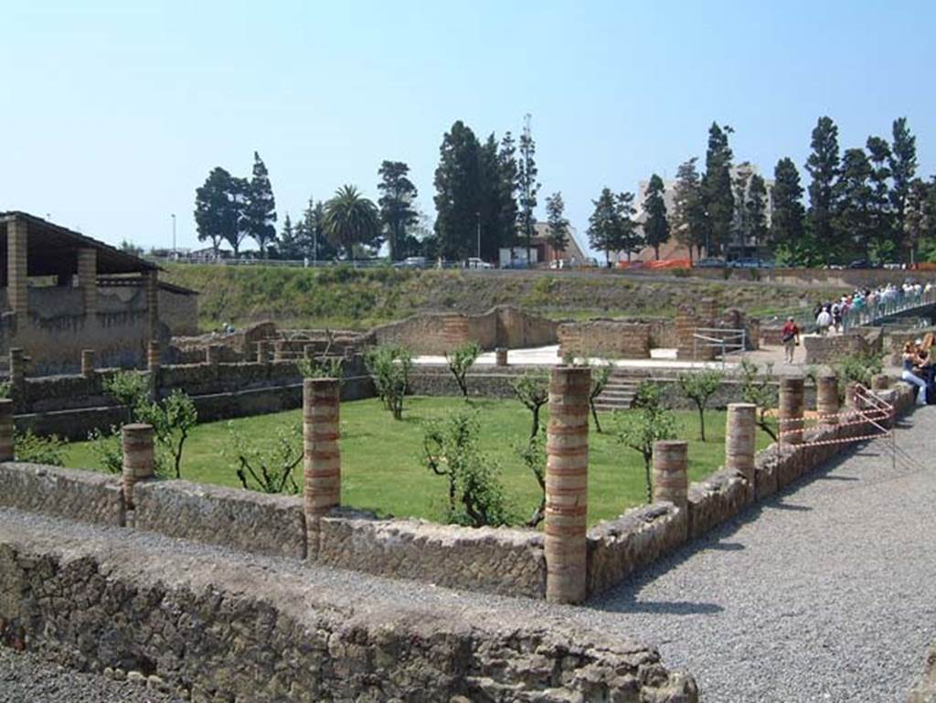 III.1/2/18/19 Herculaneum, May 2001. Area 31, looking south across large sunken peristyle.  Photo courtesy of Current Archaeology.
