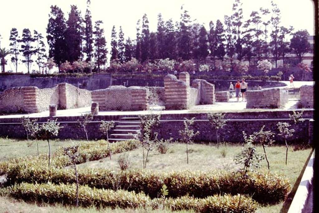 III, 1,2,18/19 Casa dell’Albergo, Herculaneum. 1978. Looking south from garden area 31 across area 64 the south portico, towards remains of house.  Photo by Stanley A. Jashemski.   
Source: The Wilhelmina and Stanley A. Jashemski archive in the University of Maryland Library, Special Collections (See collection page) and made available under the Creative Commons Attribution-Non Commercial License v.4. See Licence and use details. J78f0525
