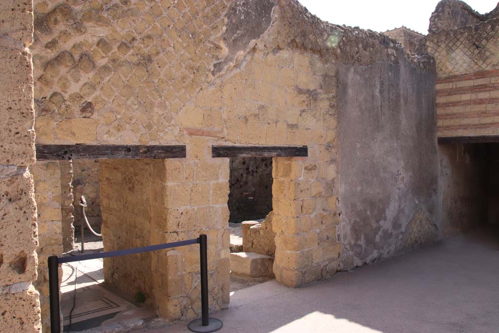 III.3 Herculaneum. September 2019. Looking towards doorways on north side of atrium. 
Photo courtesy of Klaus Heese.
