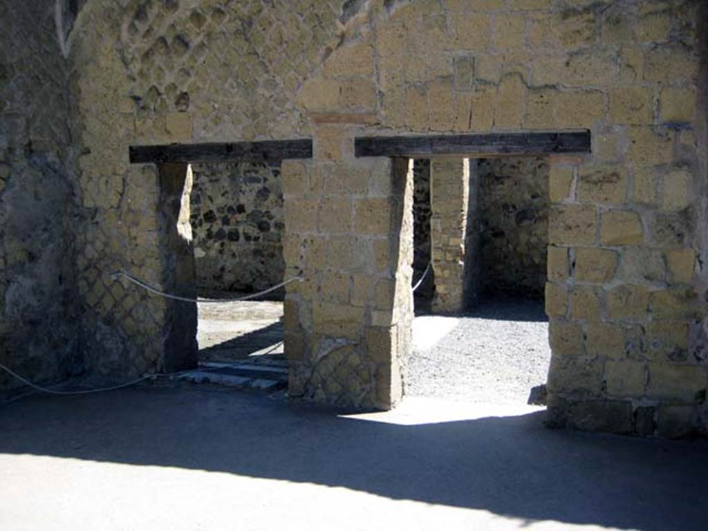 III.3 Herculaneum. June 2011. Looking towards north wall of atrium. 
Doorway to triclinium, on left, and doorway to small corridor, on right. Photo courtesy of Sera Baker.
