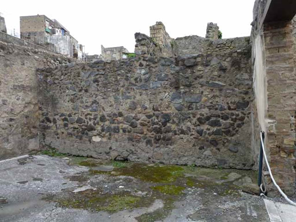 III.3 Herculaneum. May 2010. Looking north in triclinium with two doorways, in north-west corner of atrium