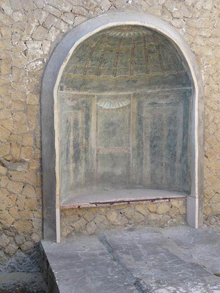 III.3 Herculaneum. August 2013. Nymphaeum against east wall. Photo courtesy of Buzz Ferebee. The original mosaic niche is now in the Naples Archaeological Museum, inv. no. 10008.

