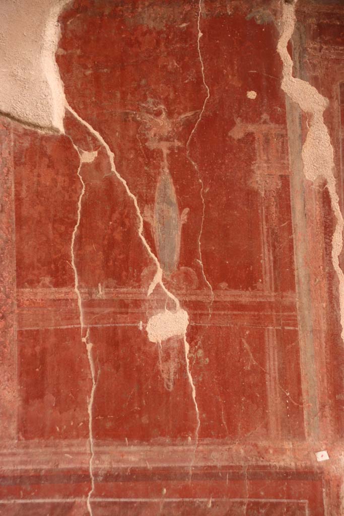 III.3 Herculaneum. September 2019. Detail of painted decoration on north wall of tablinum. 
Photo courtesy of Klaus Heese.
