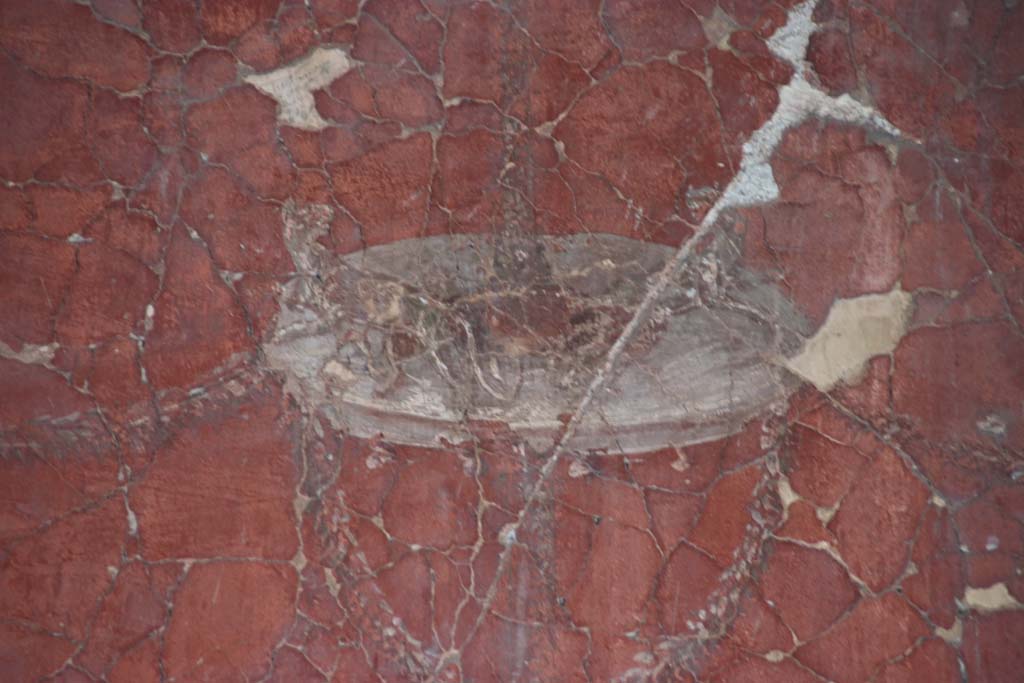 III.3 Herculaneum, September 2017. Detail of painted decoration from south end of east wall of triclinium.
Photo courtesy of Klaus Heese.
