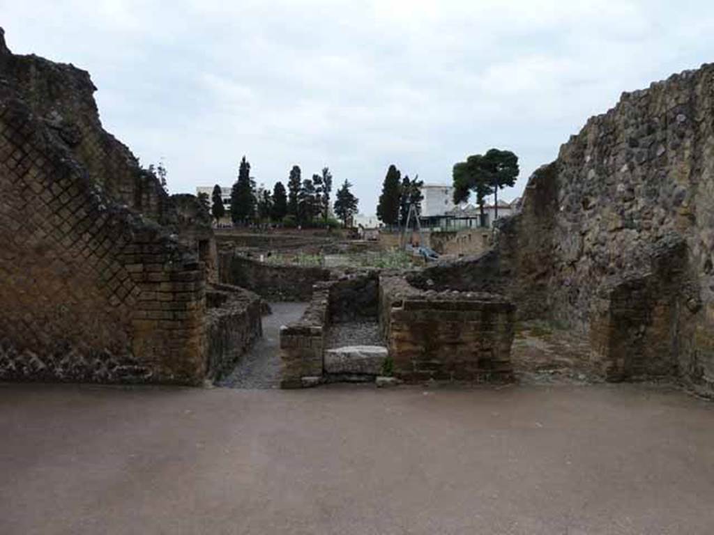 III.3 Herculaneum. May 2010. Looking south from atrium.
The corridor leading to the southerly rooms is left of centre, then there would have been steps to an upper floor, and a doorway to a cubiculum, on right.
According to Maiuri, it was possible that the entire south wing, connected to the atrium by a corridor, was a later addition to the original house.
See Maiuri, Amedeo, (1977). Herculaneum. 7th English ed, of Guide books to the Museums Galleries and Monuments of Italy, No.53 (p.34).


