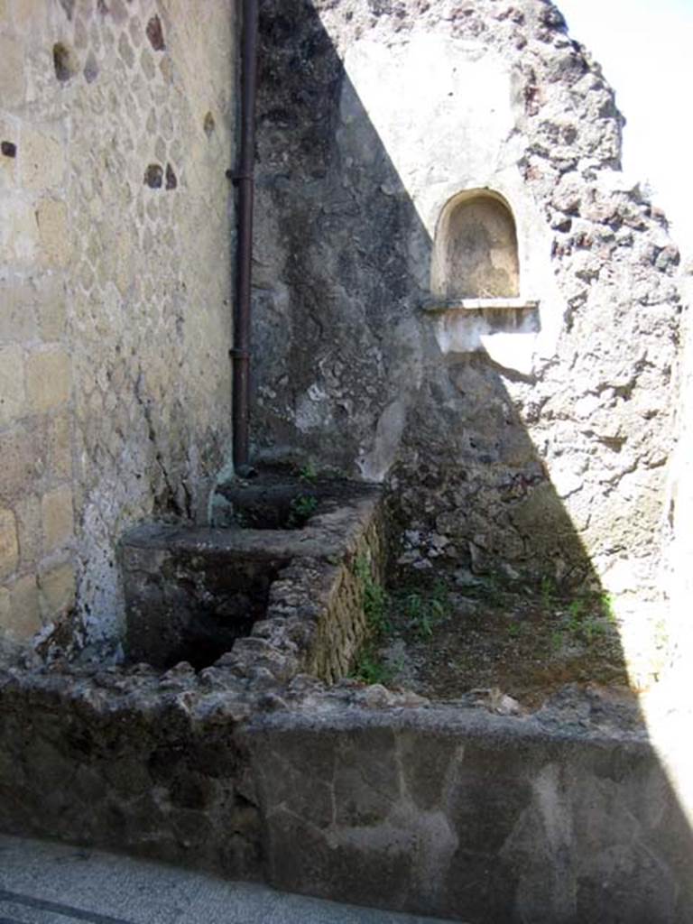 III.3 Herculaneum. June 2011. Looking towards south wall with niche, in area on south side of room 20. 
Photo courtesy of Sera Baker. 

