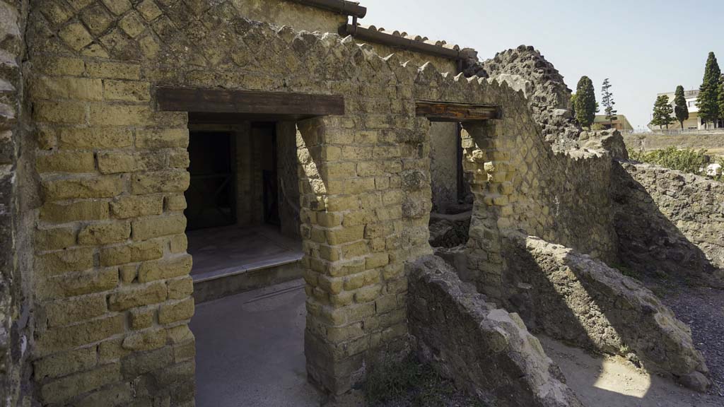 III.3 Herculaneum. August 2021. Looking south-east in rooms in southern part of house. 
The doorway to room 20 and room 17 is on the left. Photo courtesy of Robert Hanson
