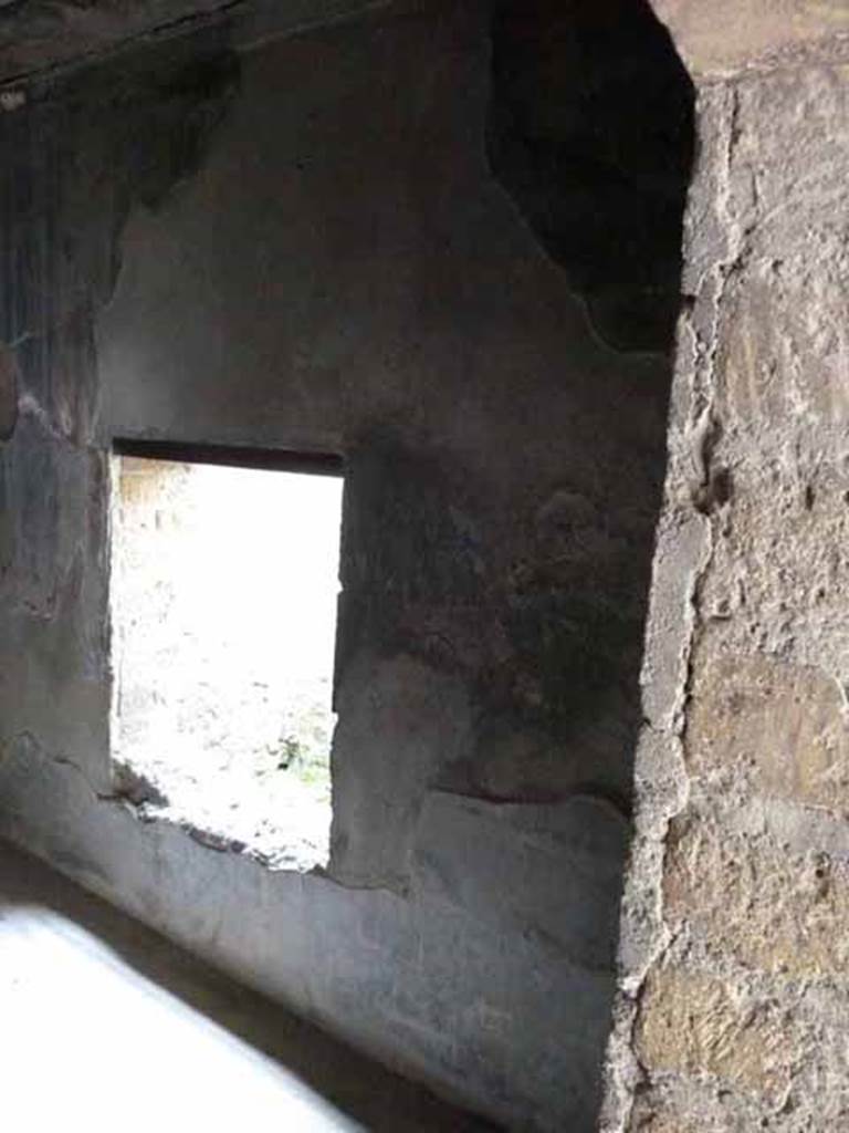 III.3 Herculaneum. May 2010. Room 19, south wall with window.