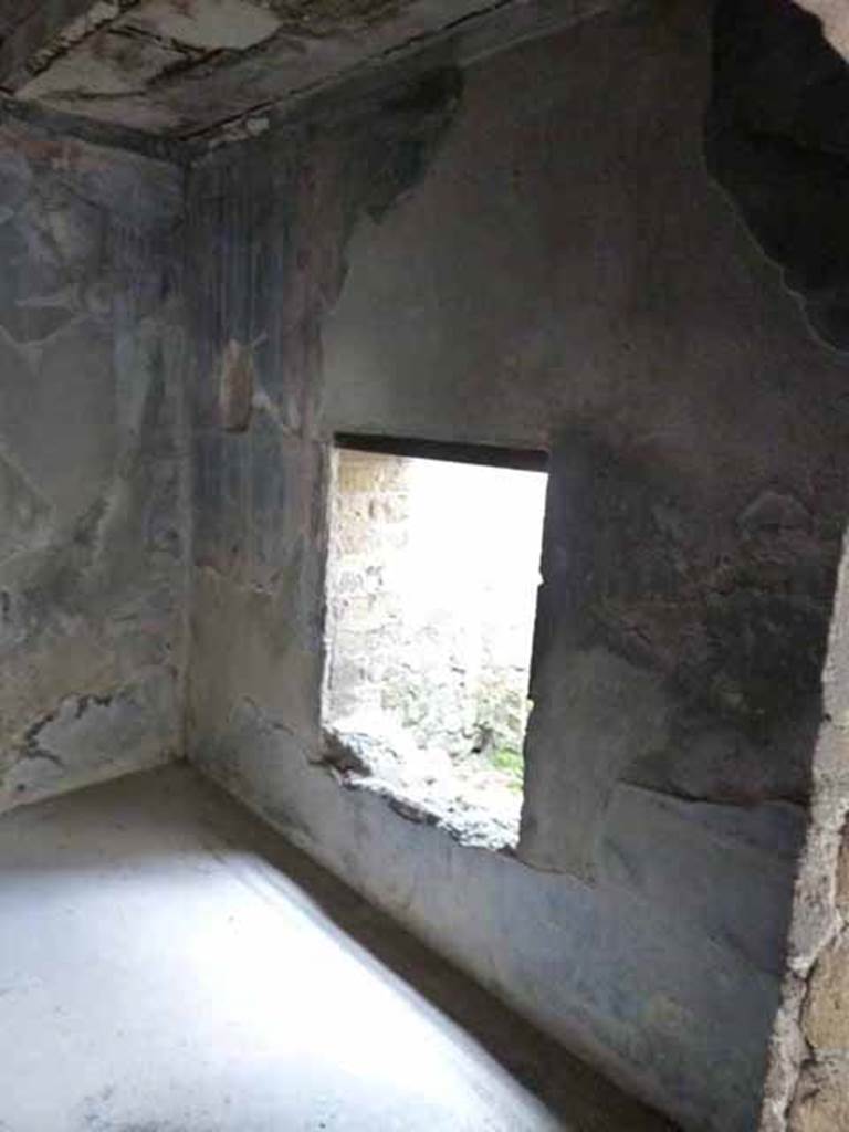 III.3 Herculaneum. May 2010. Room 19, south wall with window.