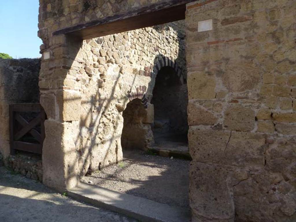 lll.4 Herculaneum, October 2012. Looking north-east towards doorway to shop, workshop or small house on east side of Cardo III Inferiore.   Photo courtesy of Michael Binns.
