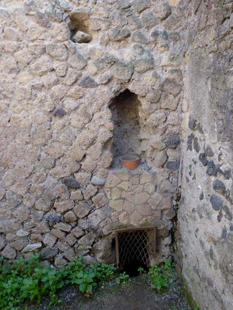 lll.4 Herculaneum, October 2012. Downpipe in east wall in south-east corner of second room. Photo courtesy of Michael Binns.
