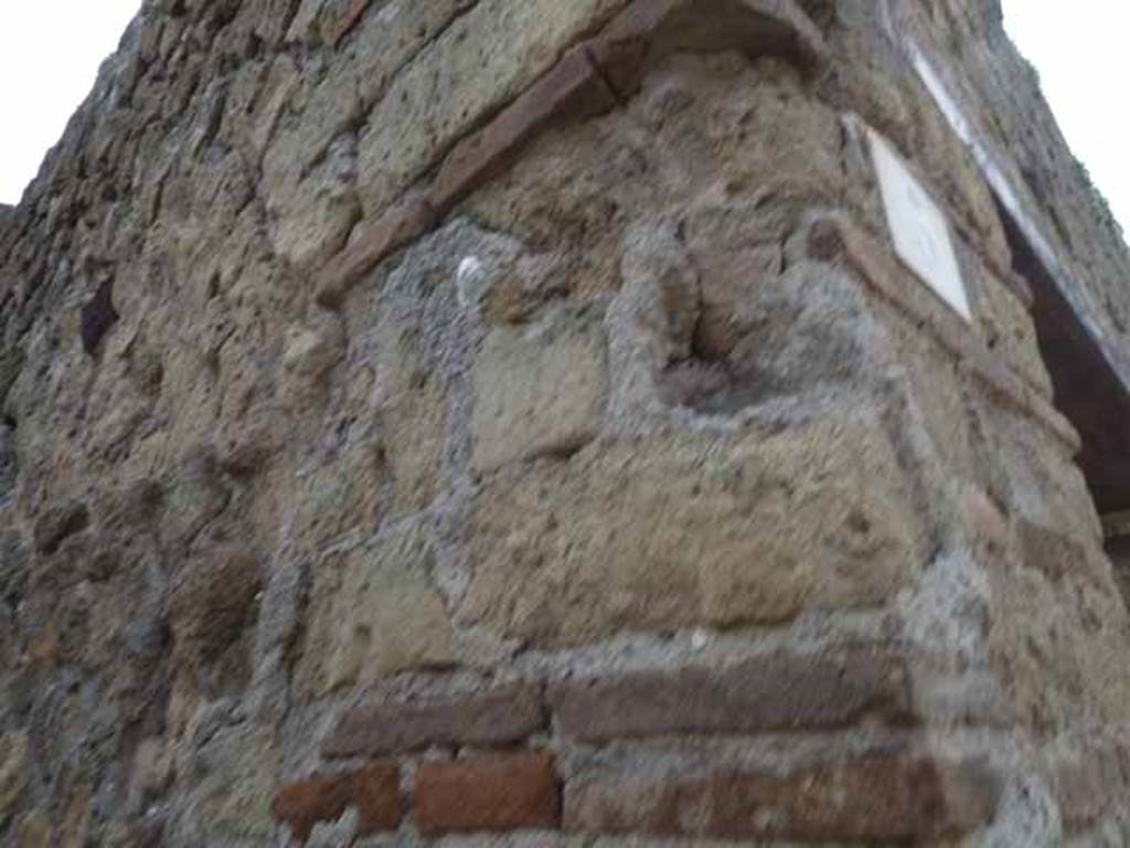 III.5, Herculaneum. May 2010. Pilaster on south side of doorway and south wall of steps to upper floor above 