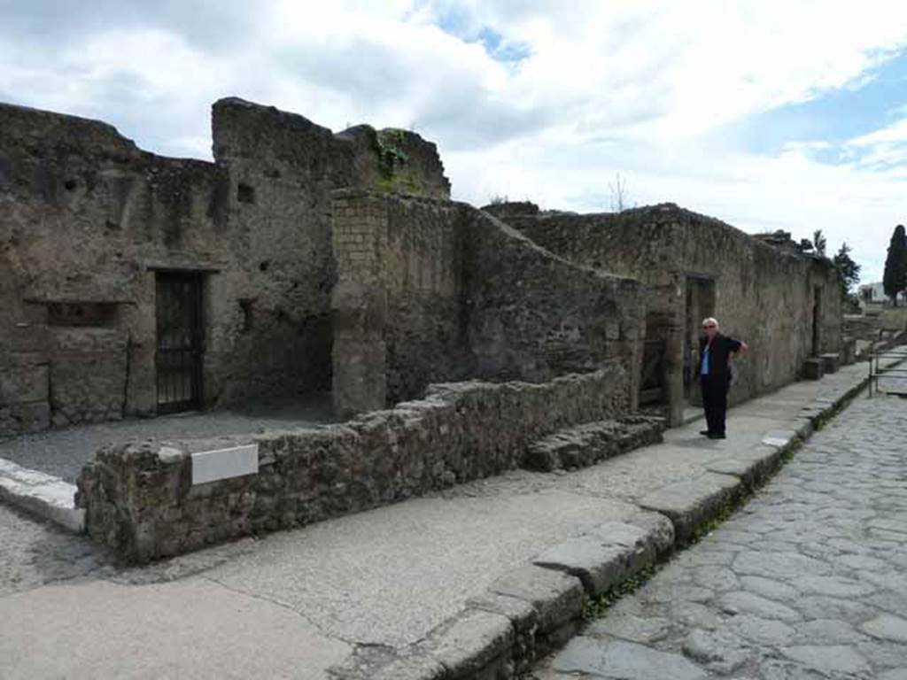 Ins. III.6 on left, 5 and 4, on north-east corner of Ins. III, Herculaneum. May 2010.
Looking south along east side of Cardo III Inferiore.
