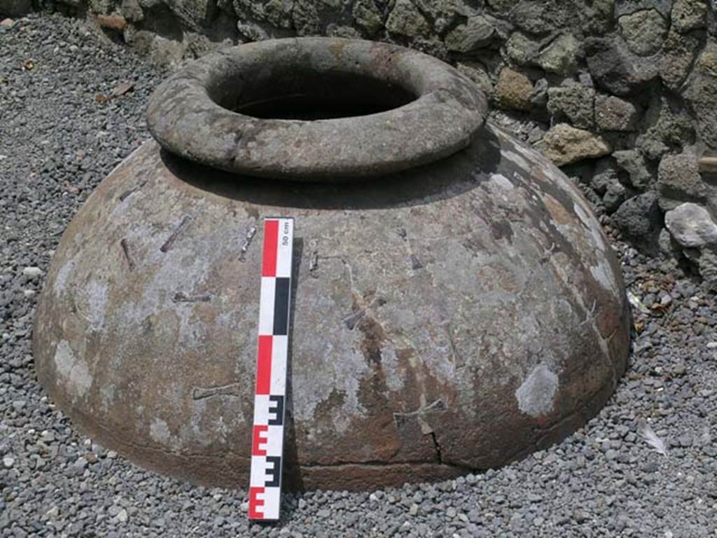 III.6, Herculaneum, June 2006. Large terracotta dolium embedded in flooring.
Photo courtesy of Nicolas Monteix.
