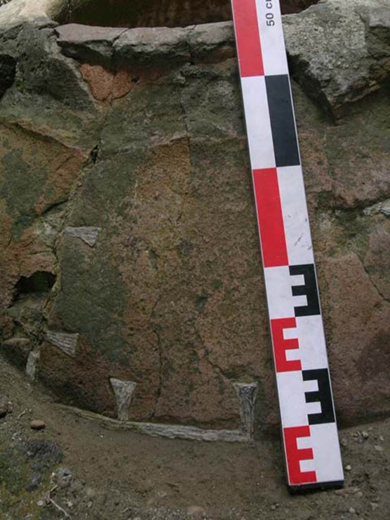 III.6, Herculaneum, June 2006. Detail of large terracotta dolium embedded in flooring. Photo courtesy of Nicolas Monteix.
