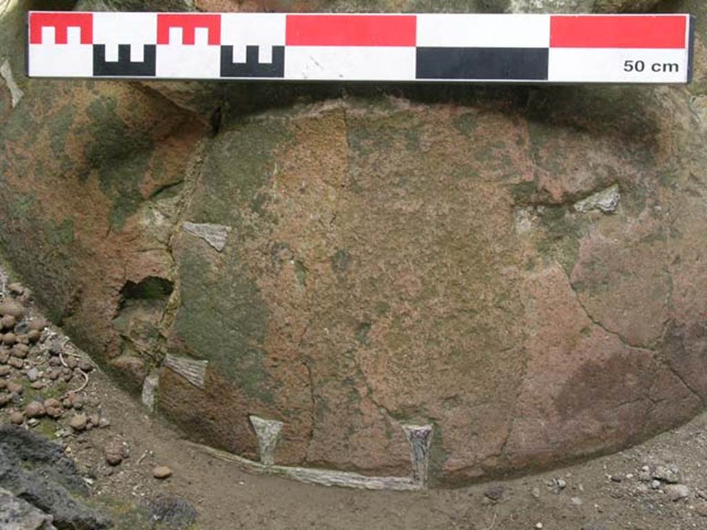 III.6, Herculaneum, June 2006. Detail of large terracotta dolium embedded in flooring. Photo courtesy of Nicolas Monteix.
