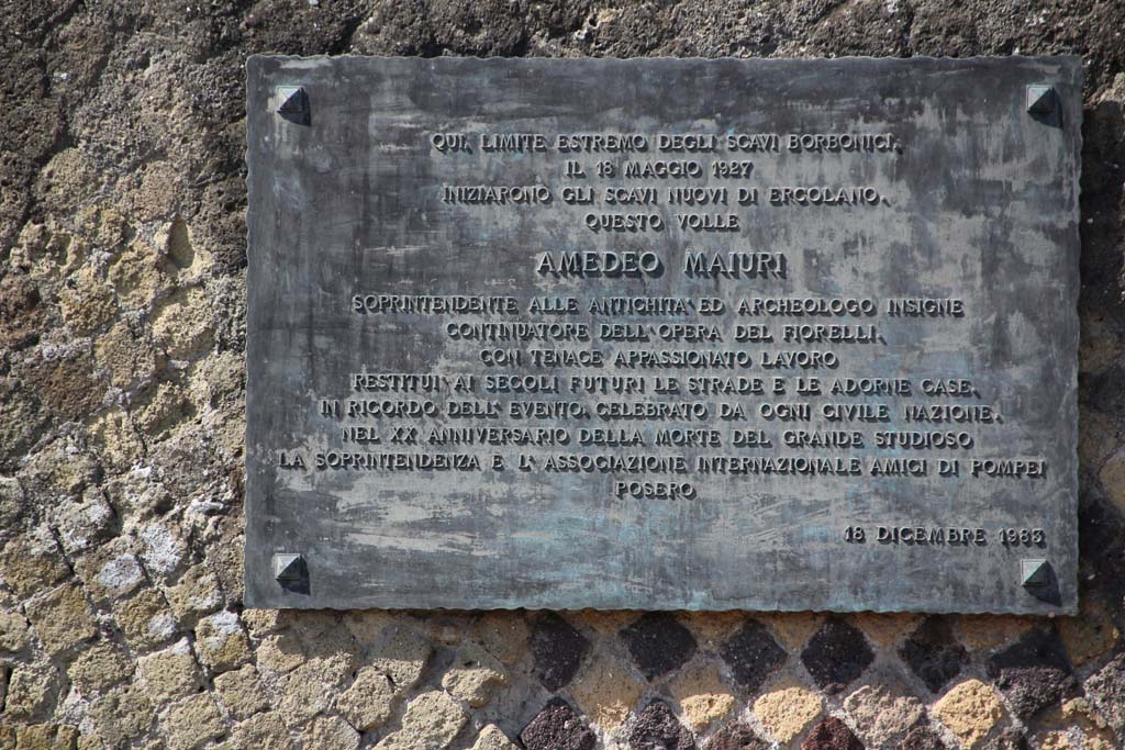 III.7 Herculaneum, April 2014. Plaque on wall on west side of entrance doorway. Photo courtesy of Klaus Heese.