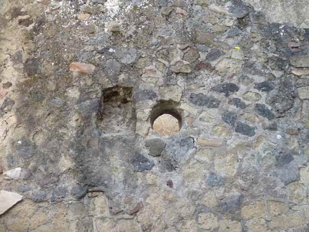 Ins. III.9. Herculaneum. May 2010. East wall of shop-room.