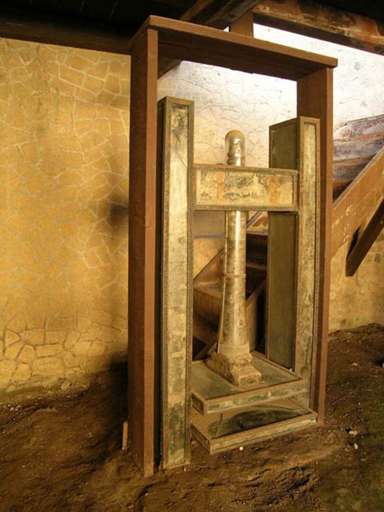 III.10, Herculaneum. May 2005. Wooden press. Photo courtesy of Nicolas Monteix. 