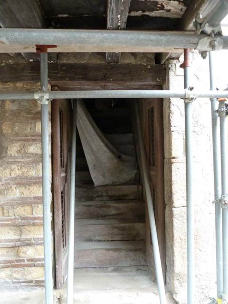 Ins. III 13, Herculaneum, May 2015. Looking west towards steps to upper floor.