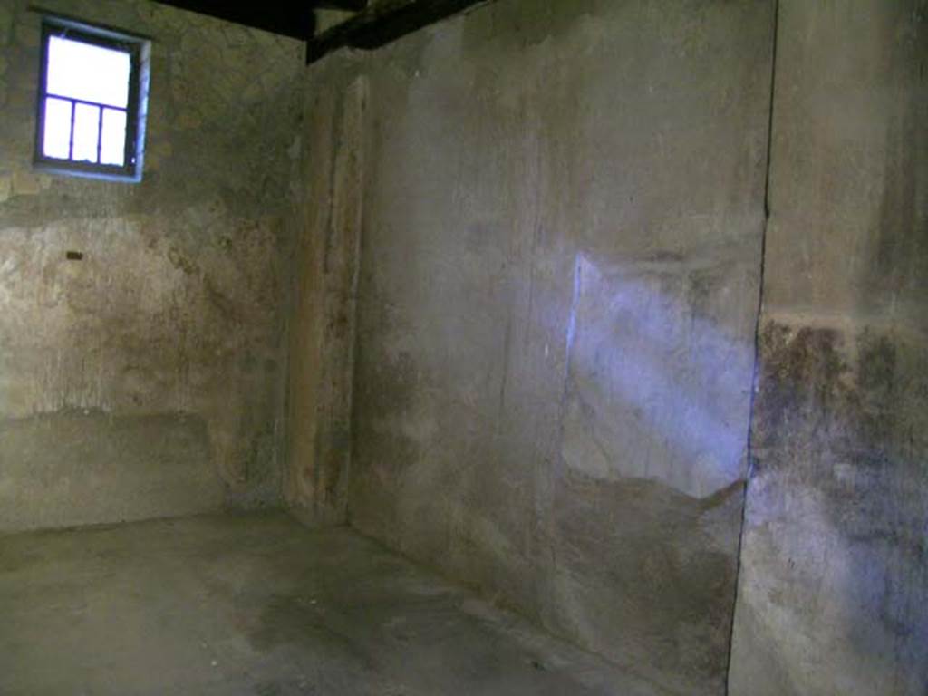 III.13, Herculaneum. April 2005. Looking towards south-west corner and west wall of room 3 on upper floor. 
Photo courtesy of Nicolas Monteix.
