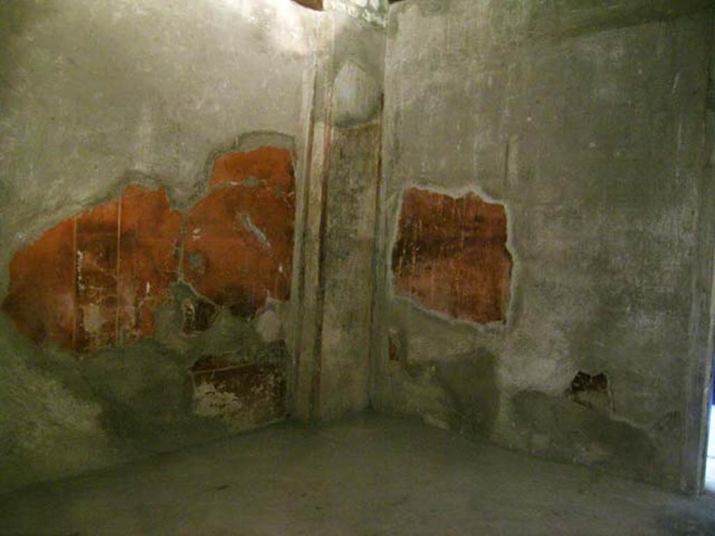 III.13, Herculaneum. April 2005. Looking towards north-west corner, with doorway on right, in north wall.
Photo courtesy of Nicolas Monteix.
