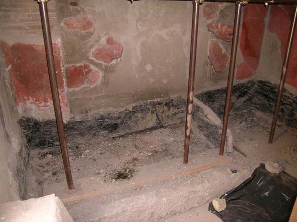 III.14, Herculaneum. April 2005. Room 2, looking towards east wall. Photo courtesy of Nicolas Monteix.
Found in this room were two carbonised beds placed at an angle in the corner of the room.
