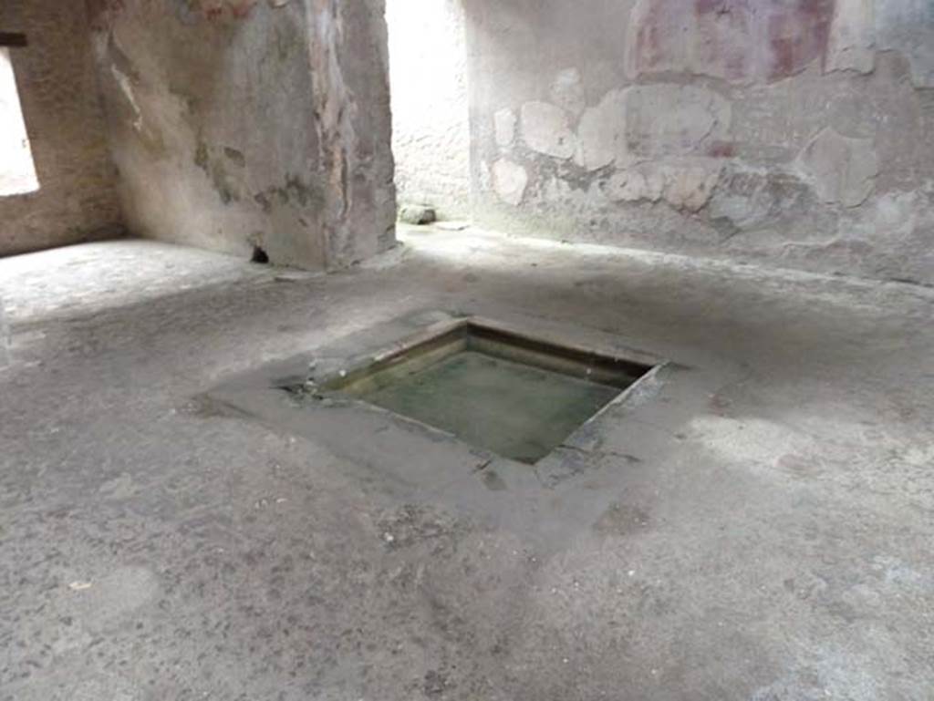 III.16, Herculaneum, September 2015. Atrium 9, looking north-west across impluvium set into floor of cocciopesto.