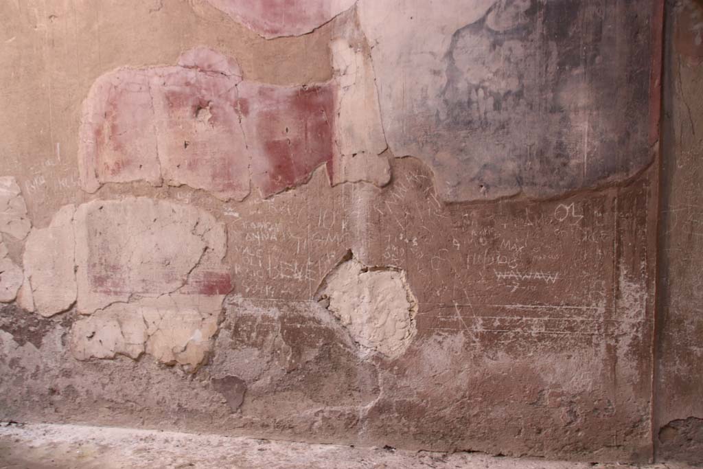 III.16, Herculaneum, October 2020. 
Atrium, room 9, north wall in north-east corner, with doorway to room 3, on right. Photo courtesy of Klaus Heese.
