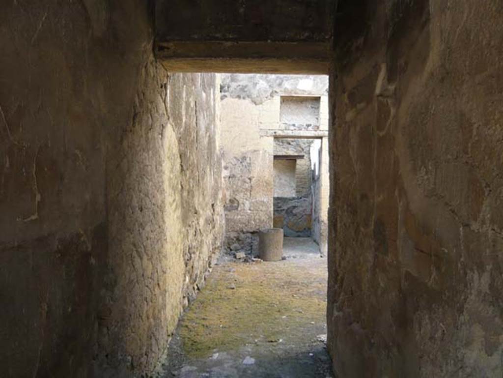 III.17 Herculaneum, August 2013. Looking west along entrance corridor towards small atrium. Photo courtesy of Buzz Ferebee.
