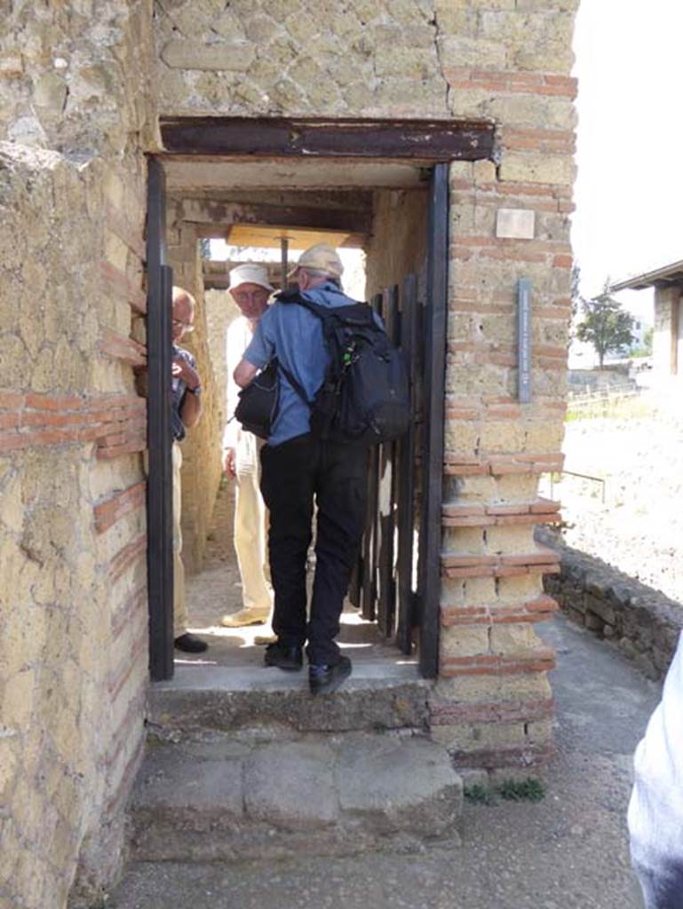 IV.2/1, Herculaneum, September 2016. Looking towards open entrance doorway for the Herculaneum Society visit.  Photo courtesy of Michael Binns.
