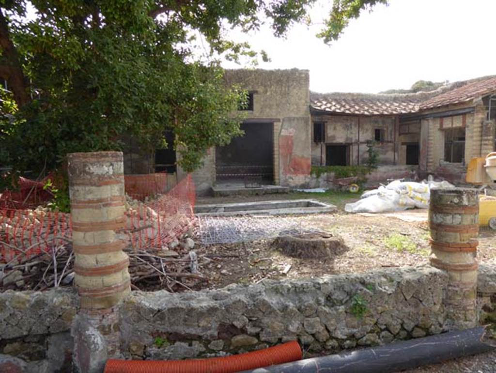 IV.1/2 Herculaneum, October 2014. Looking east across peristyle towardsdoorway to central exedra. Photo courtesy of Michael Binns.