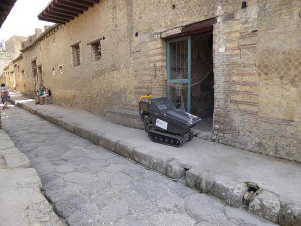 Cardo IV Inferiore, Herculaneum. October 2014. Looking north along east side, with doorway to IV.2.  Photo courtesy of Michael Binns.
