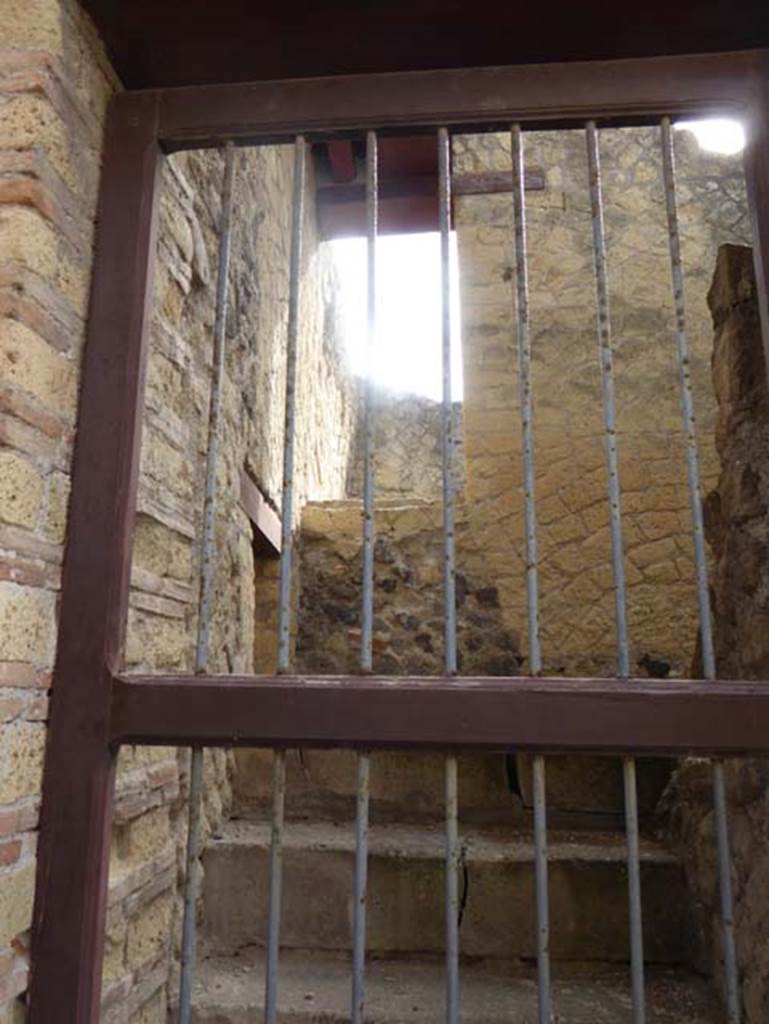 IV.3, Herculaneum, October 2014.East wall with doorway on upper floor. Photo courtesy of Michael Binns.
