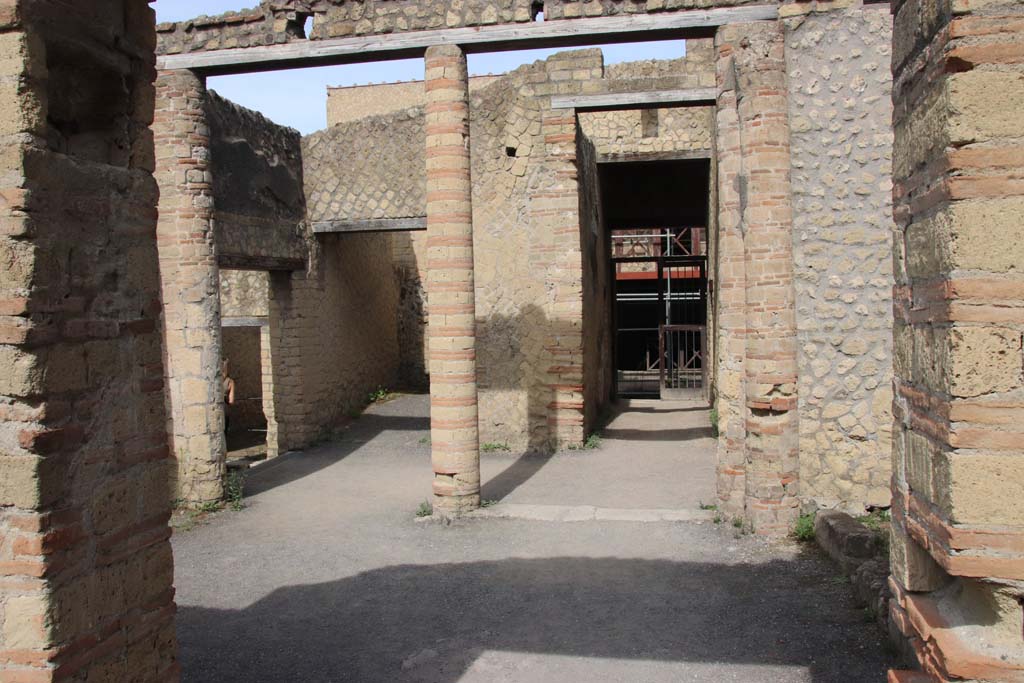 IV.4 Herculaneum. September 2017. Looking west from open courtyard 6, towards small courtyard 3, and through to entrance corridor.
Photo courtesy of Klaus Heese.
