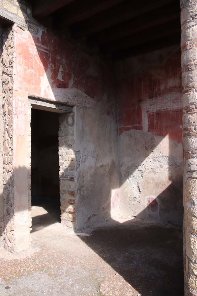 IV.4, Herculaneum, October 2020.  
Looking towards doorway to room 4 in west wall of small courtyard 3. Photo courtesy of Klaus Heese.

