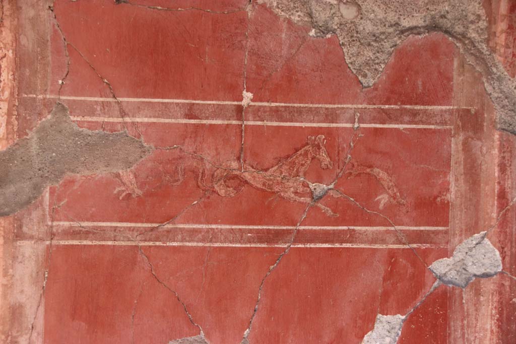 IV.4, Herculaneum, October 2020. Room 4, detail of panel in centre of west wall of cubiculum. Photo courtesy of Klaus Heese. 