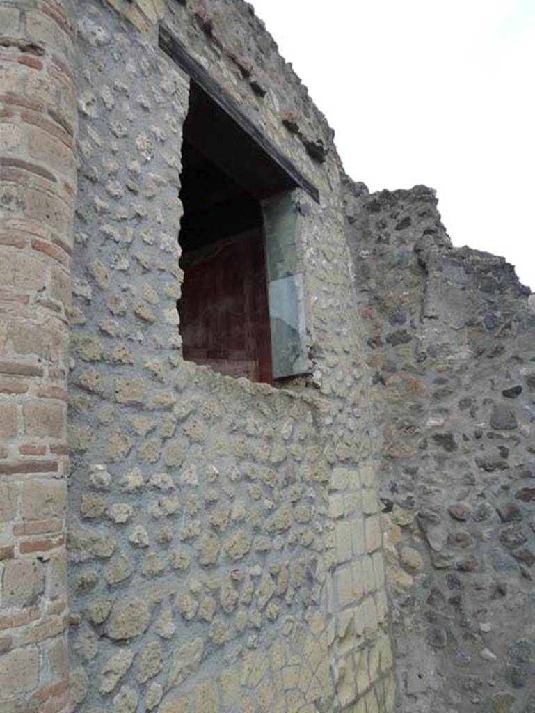 IV.4 Herculaneum. September 2015. Open courtyard 6, looking towards west wall with window from courtyard 3, and north-west corner. 
