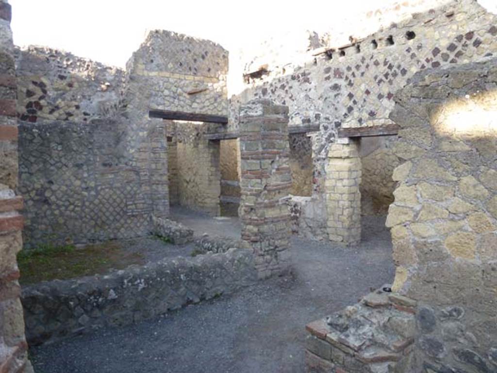 IV.4 Herculaneum. October 2012. Room 16, looking west from triclinium through doorway into courtyard 12.  Photo courtesy of Michael Binns.
