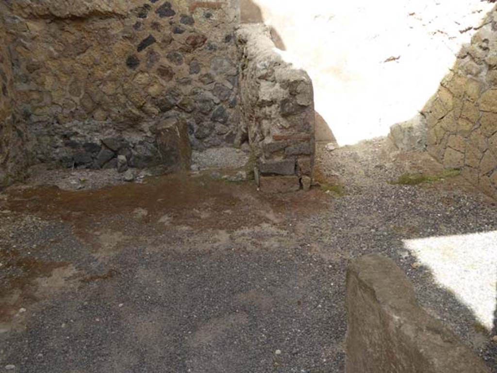 IV.4 Herculaneum. October 2014. 
Room 5, looking west across kitchen, with latrine, on right. Photo courtesy of Michael Binns.
