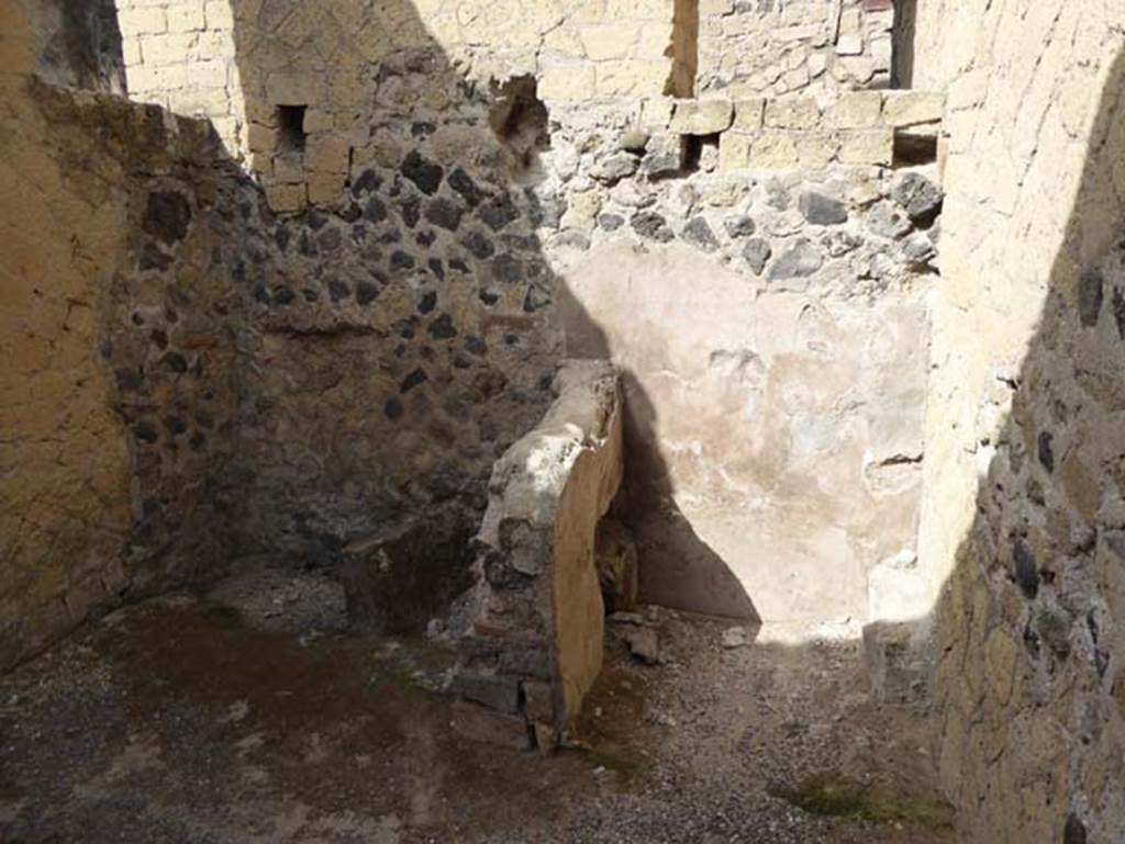 IV.4 Herculaneum. October 2014. Room 5, looking towards west wall and latrine in north-west corner of kitchen.   Photo courtesy of Michael Binns.
