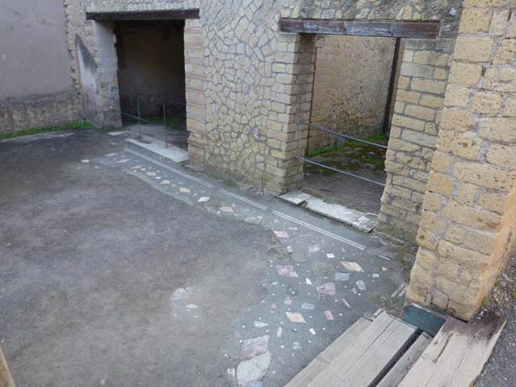 IV.4 Herculaneum. October 2012. Vestibule 17, looking towards west wall with doorways to rooms 19, on left, and 18. Photo courtesy of Michael Binns.
